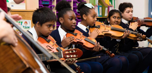 children playing string instruments